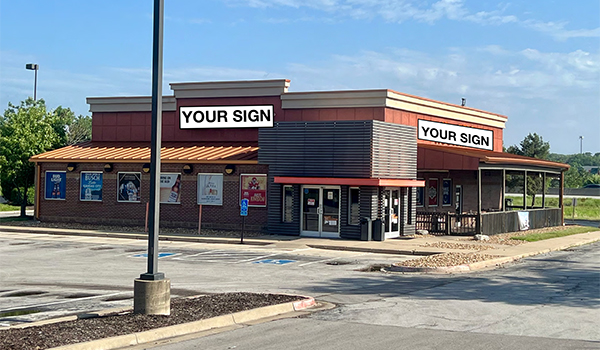 photo of stand alone building with patio.
